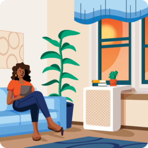 Illustration of a woman sitting on a couch reading a tablet in a sunlit room with a room heat pump below the window.