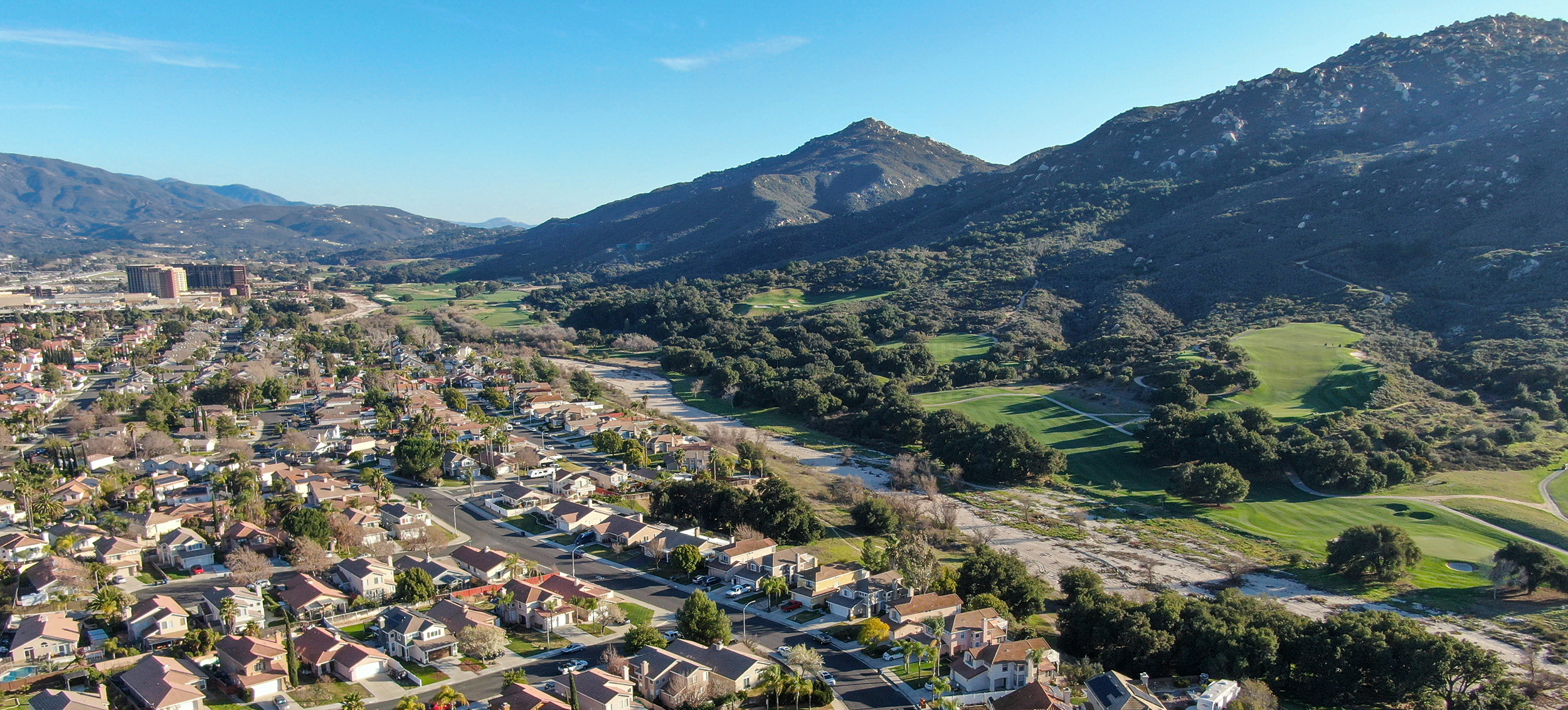 A drone shot of a California neighborhood, with potential to benefit from market transformation initiative development