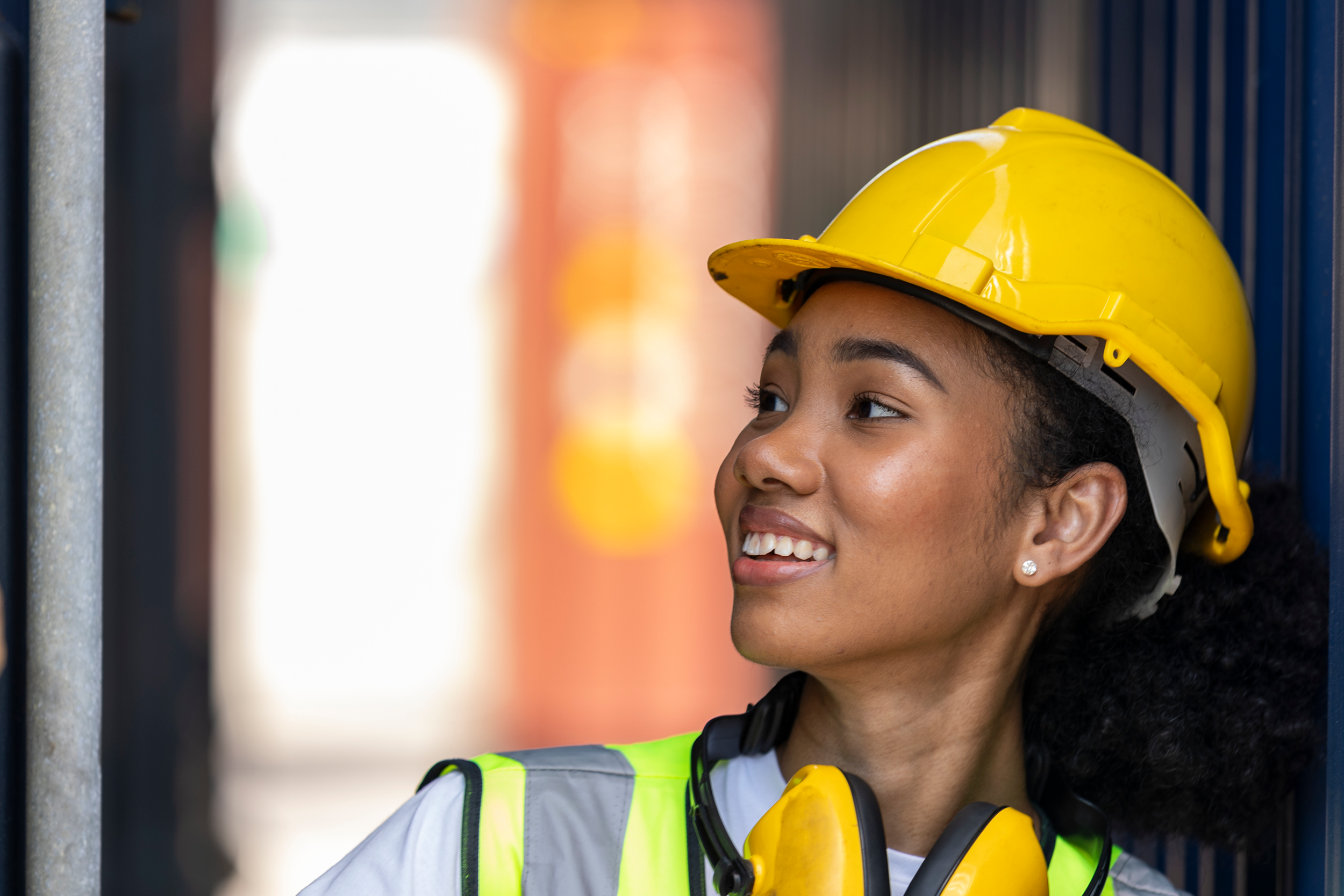 Woman smiling in hard hat